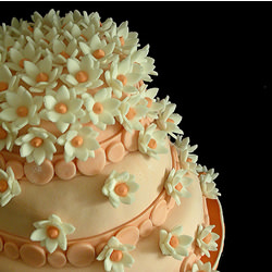 Petite Flowers Over a Wedding Cake