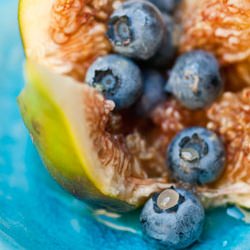 A Fig, Some Blueberries and A Spoon