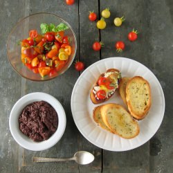 Tomato Tapenade Ricotta Crostini