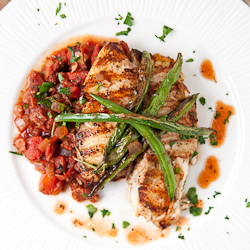 Tilapia over Tomato Pancetta Sauce