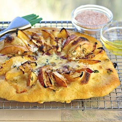 Pizza, nectarine, brie and honey
