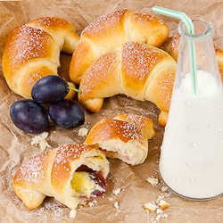 Croissants with custard and plums