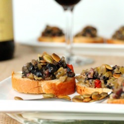Tapenade & Pepitas on Garlic Toast