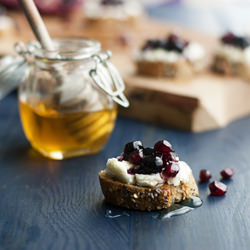 Pom-Blueberry Goat Cheese Crostini