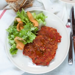 Slices of Veal Cooked in Tomato
