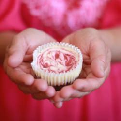 Mini Raspberry Swirl Cheesecakes