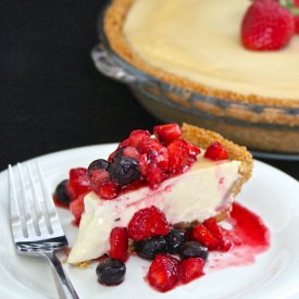 Creamy Cheesecake with Berry Sauce