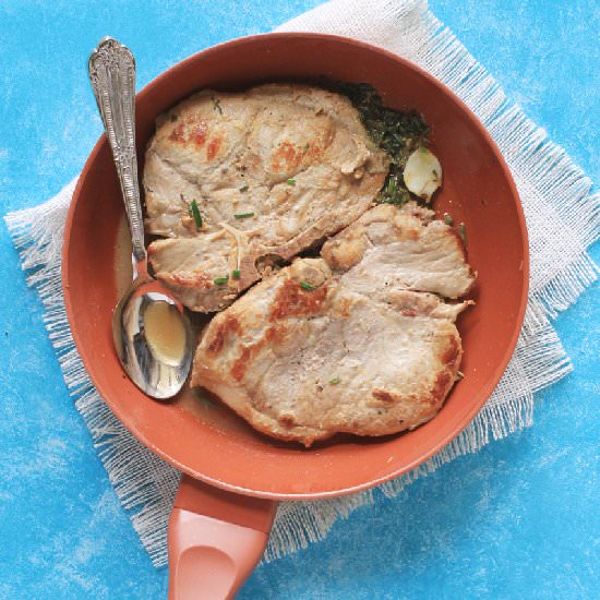Pork chop in beer and herbs