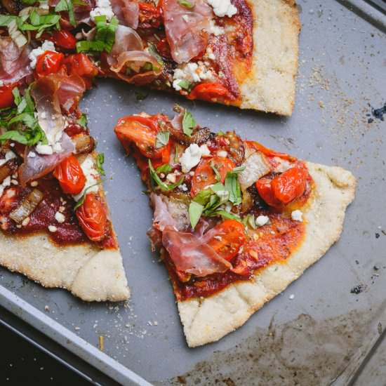 Pizza topped with prosciutto