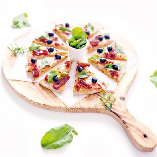 Arugula and Dried Tomatoes Pizza