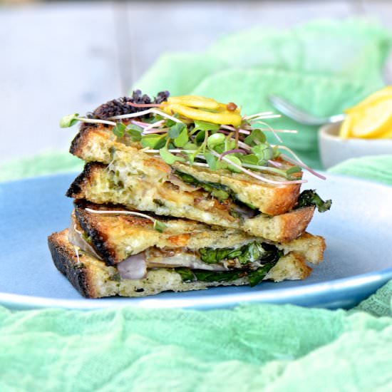 Grilled eggplant and kale panini