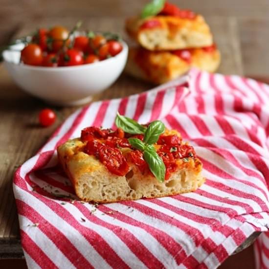 Focaccia with potatoes and cherry