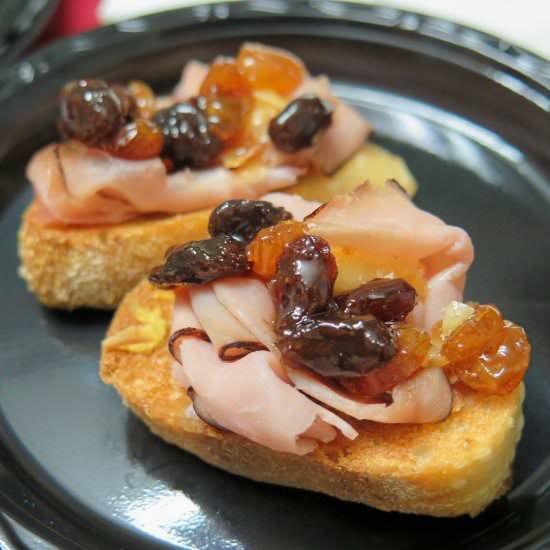 Raisin Glazed Ham & Cheese Crostini