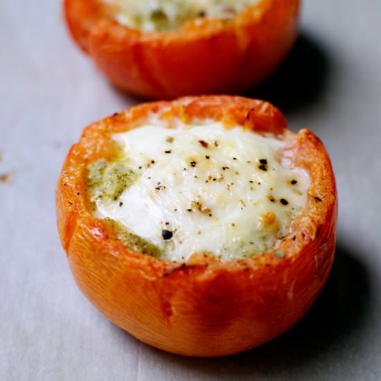 Baked Eggs in Tomatoes with Pesto
