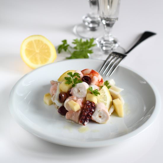 Seafood salad with apples and olive