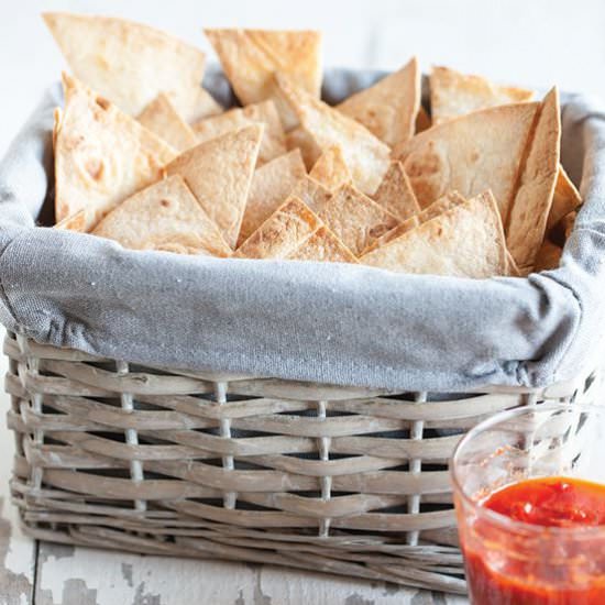 Tortilla chips with red pepper dip