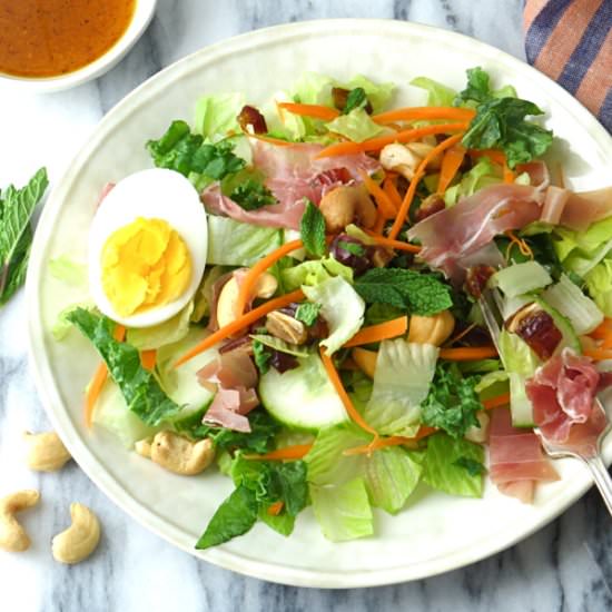 Greens with Dates, Nuts & Harissa