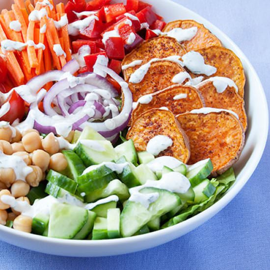 A Big Salad with Ranch Dressing