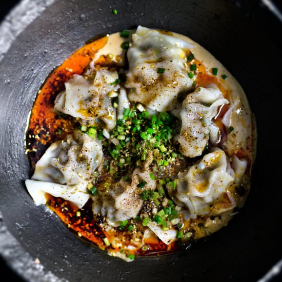 Cold wonton in spicy peanut sauce