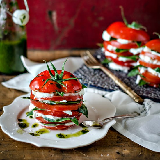 Caprese stack with basil oil