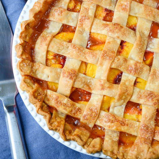 fresh peach pie with lattice crust