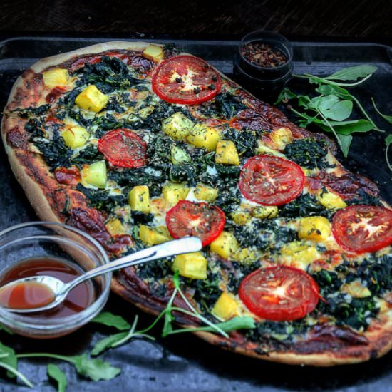 Garlicky Spinach Mango Tomato Pizza