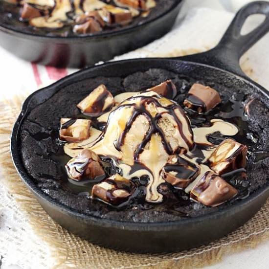 Snickers Chocolate Skillet Cookie