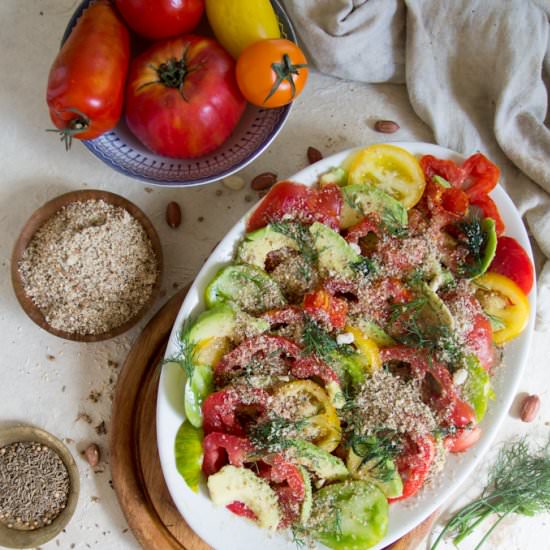 Tomato avocado salad with dukkah