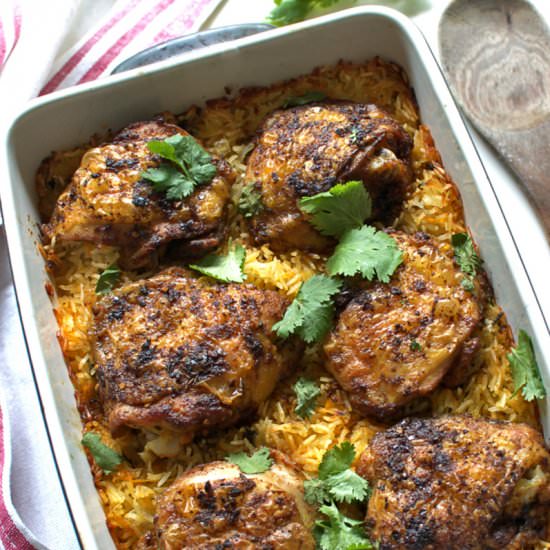 Chicken baked over rice