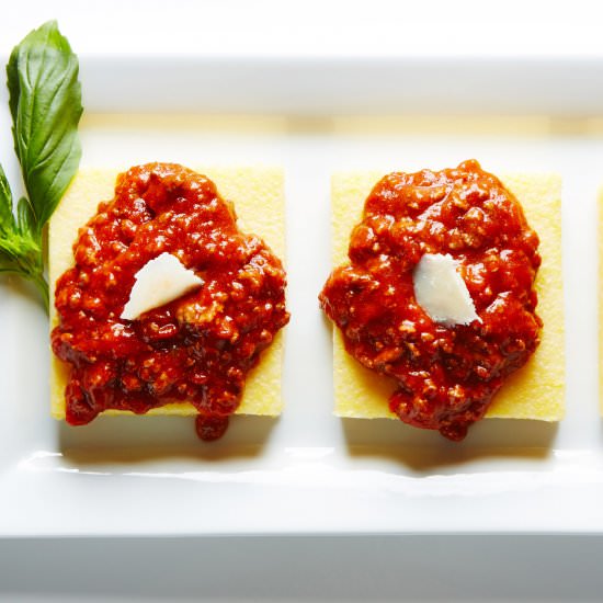 Bolognese-Smothered Parmesan Polenta