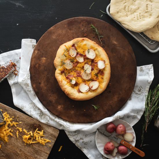 Potato, bacon, and cheddar pizza
