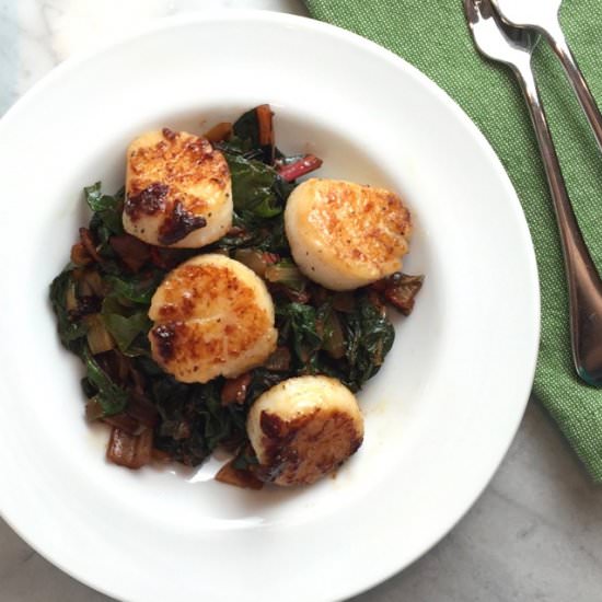 Scallops over Swiss Chard