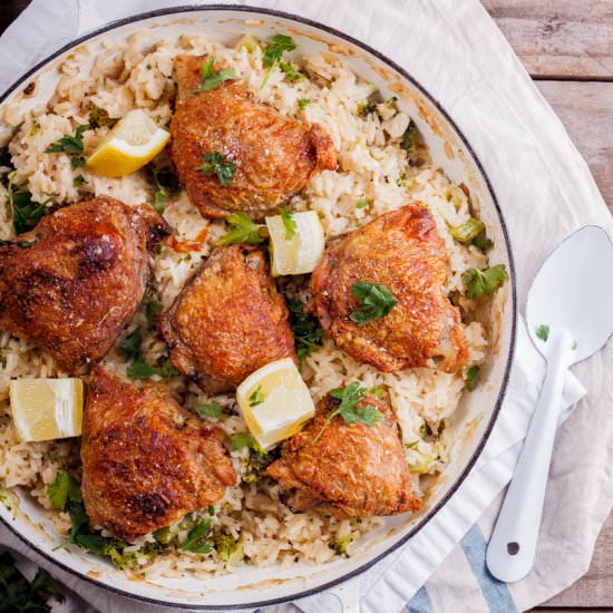 Chicken thighs on broccoli rice