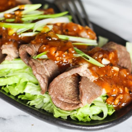 Sliced Beef Over Lettuce