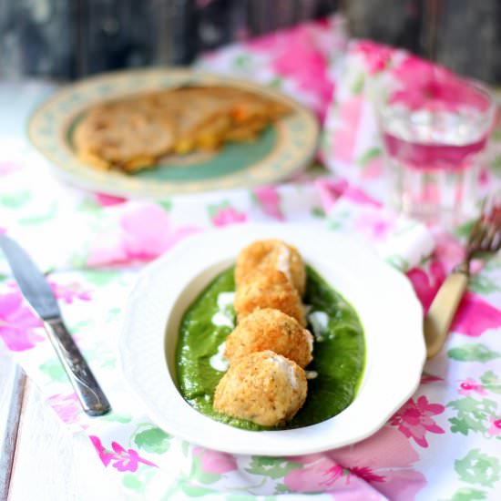Potato balls in spinach gravy