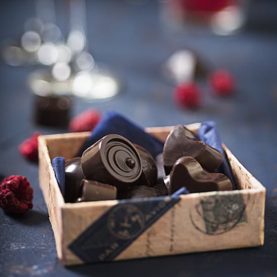 Chocolate candies with raspberries