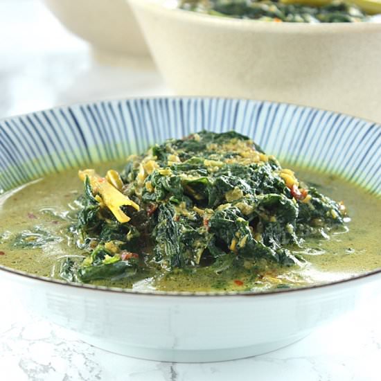 kale in spicy coconut milk broth