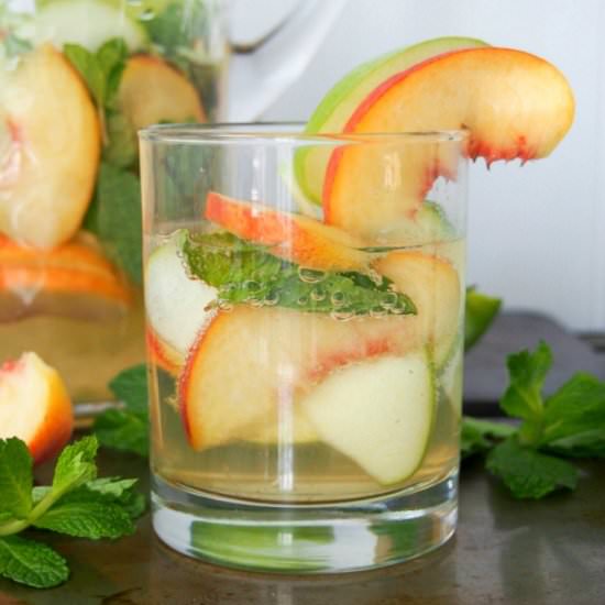 White sangria with whiskey, peach