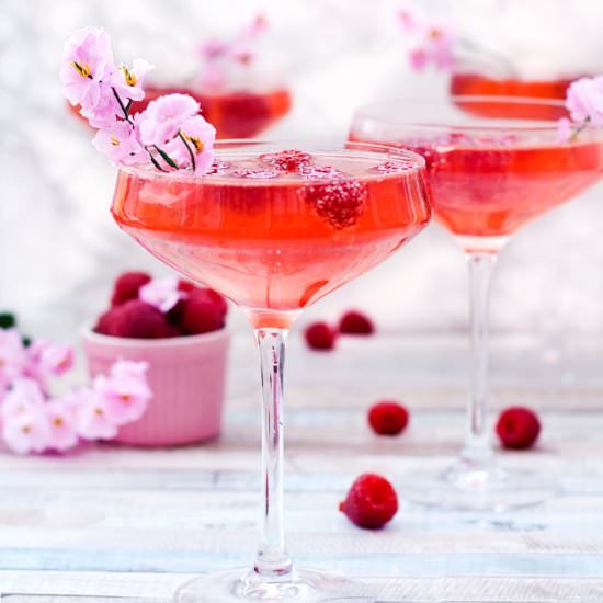 Raspberry Peach Champagne Cocktail