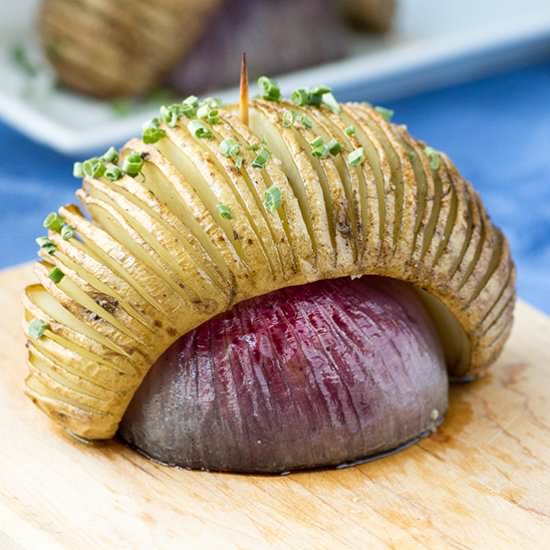 Hasselback Potatoes Over Red Onions