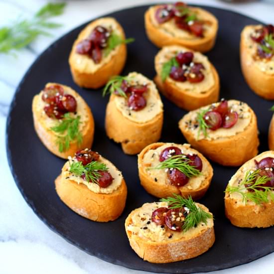 Roasted Grape Hummus Crostini
