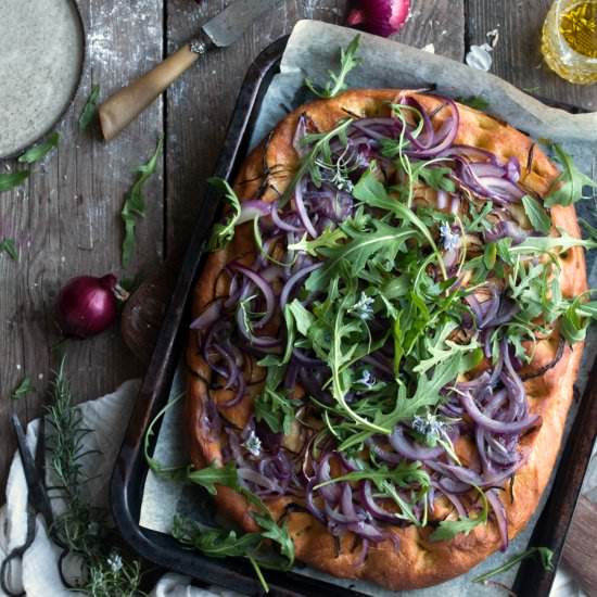 Focaccia with red onion and rocket