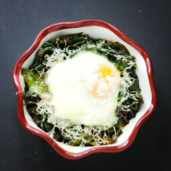 Baked eggs over Swiss chard