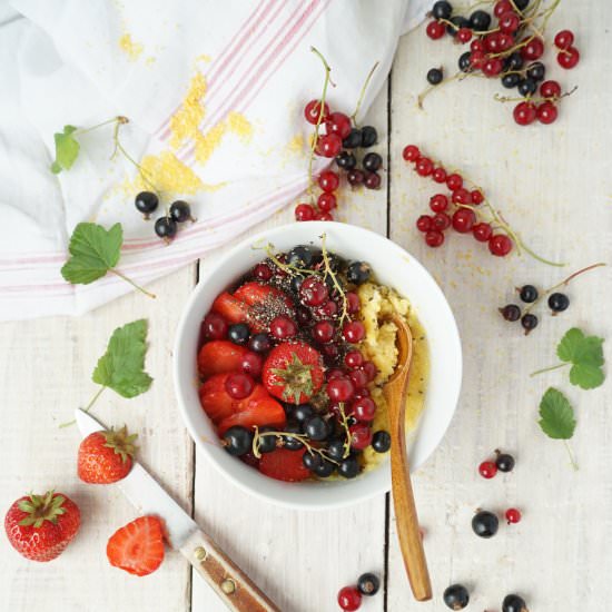Polenta porridge and red berries