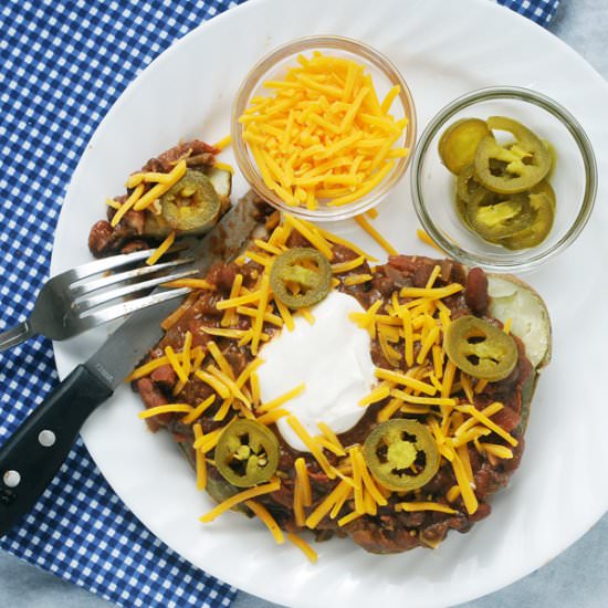 Chili Cheddar Loaded Baked Potatoes