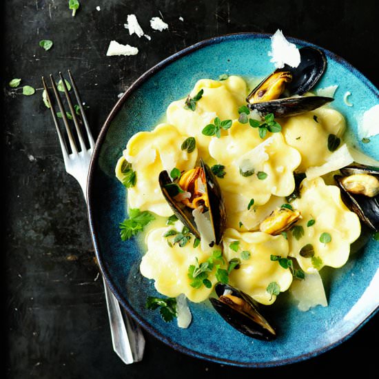 Seafood ravioli with garlic butter