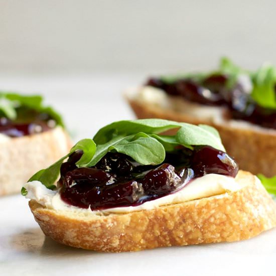 Brie Crostini w/ Cherries & Arugula