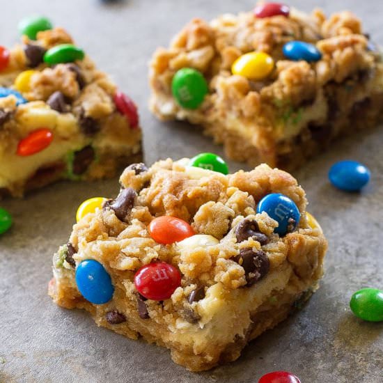 Monster Cookie Cheesecake Bars