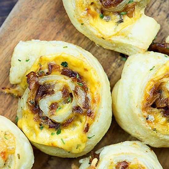 CHEESY CARAMELIZED ONION PINWHEELS