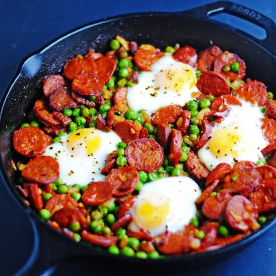 baked eggs with peas and chorizo